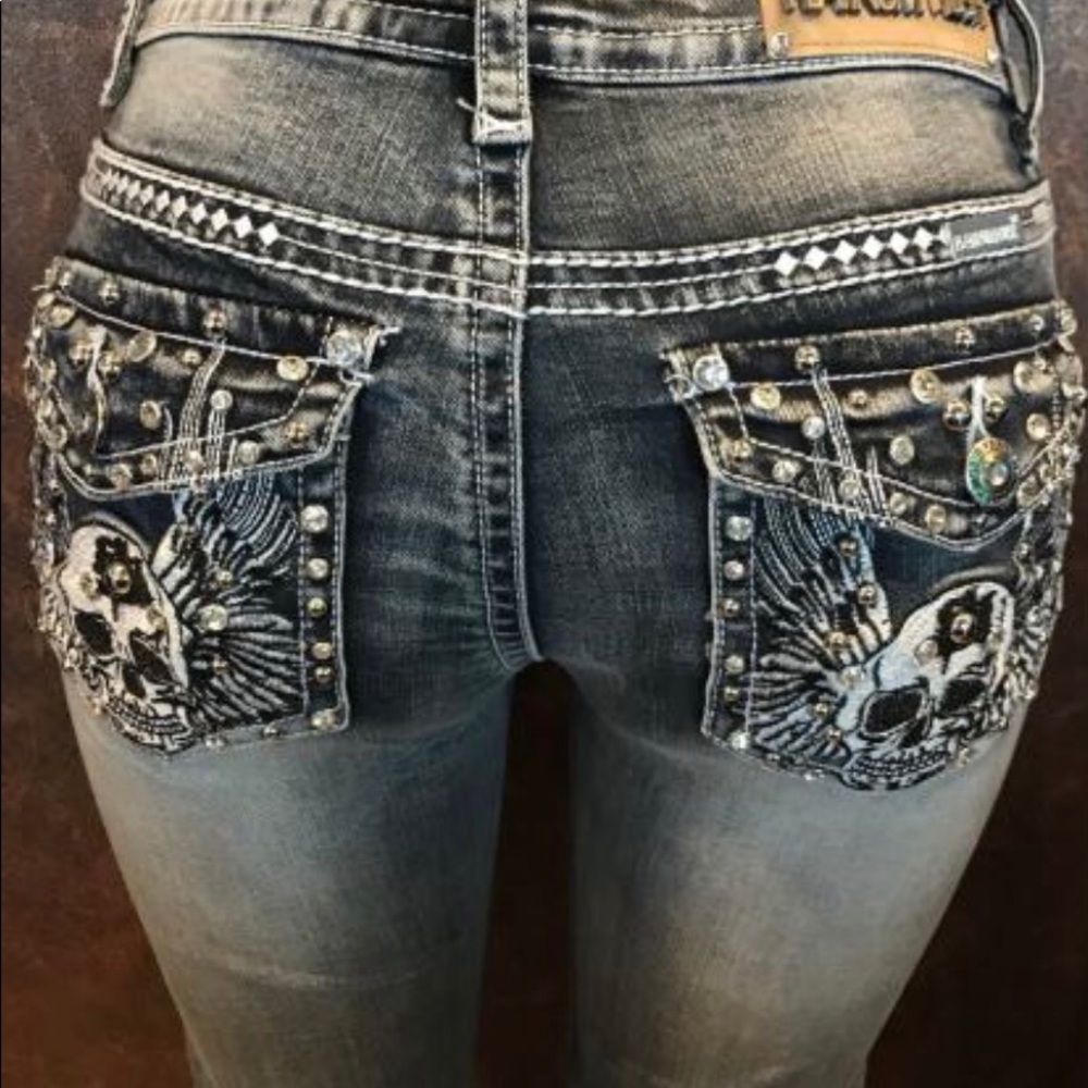 Platinum Plush jeans,boot cut, embroidered pocket's with rhinestones all over